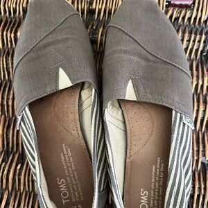 TOMS Black and Cream Striped Slip-Ons